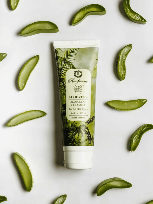 Raafiaura Aloe vera face cleanser surrounded by fresh aloe vera leaves
