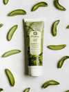 Raafiaura Aloe vera face cleanser surrounded by fresh aloe vera leaves