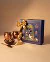 Raafiaura Gifting Box Divine Blossom with elegant design and golden ribbon, featuring spices and decorative jars
