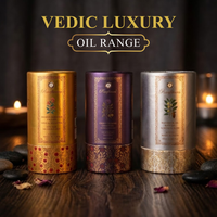 Raafiaura Swarna Radiance Face Oil and other luxury oils in elegant packaging on a wooden surface